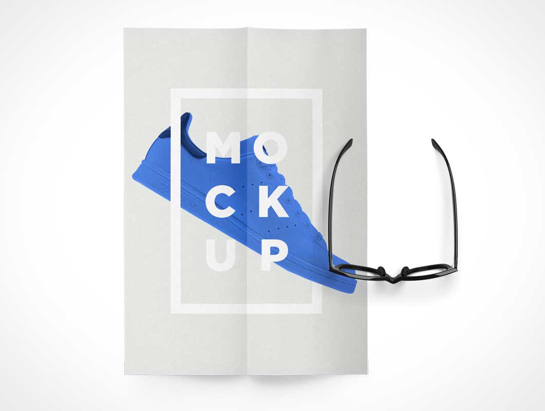 Free A4 Paper Folded Top View Eye Glasses PSD Mockup