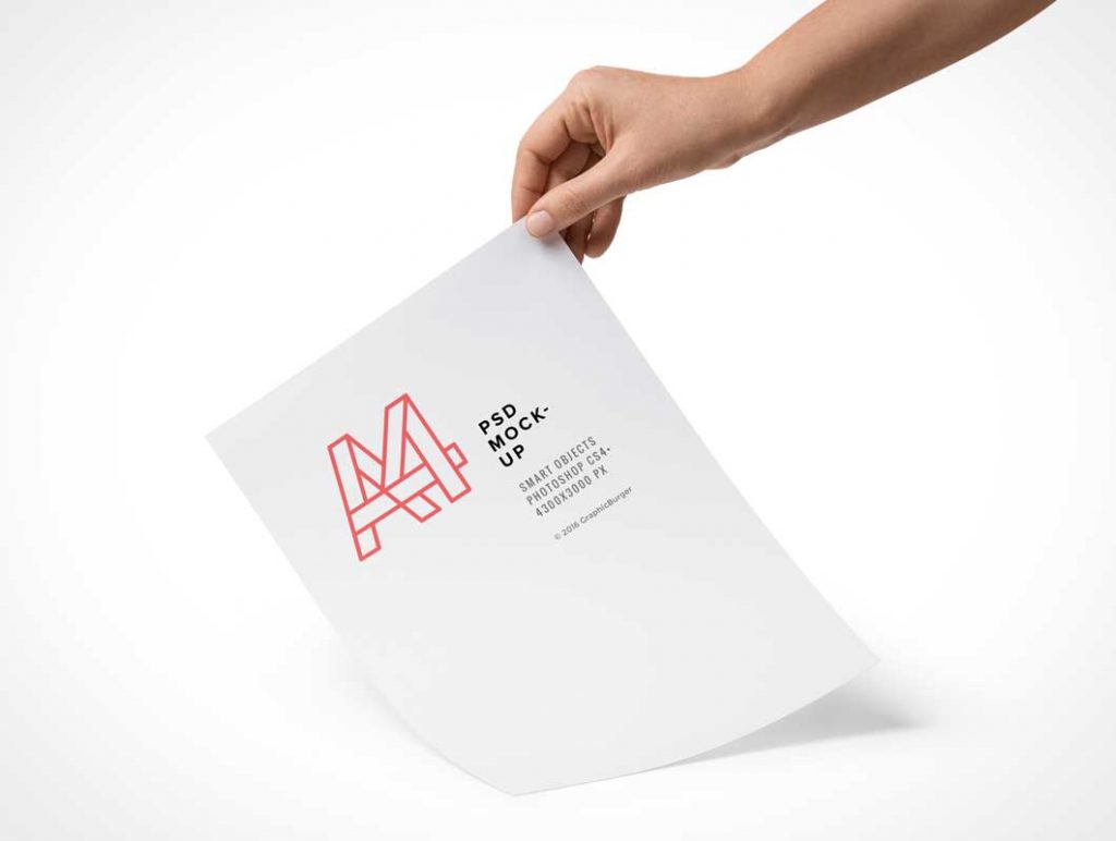 Free A4 Paper Hand Held PSD Mockup