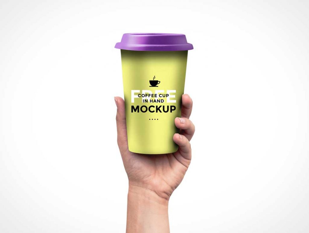 Free Coffee Cup In Hand PSD Mockup